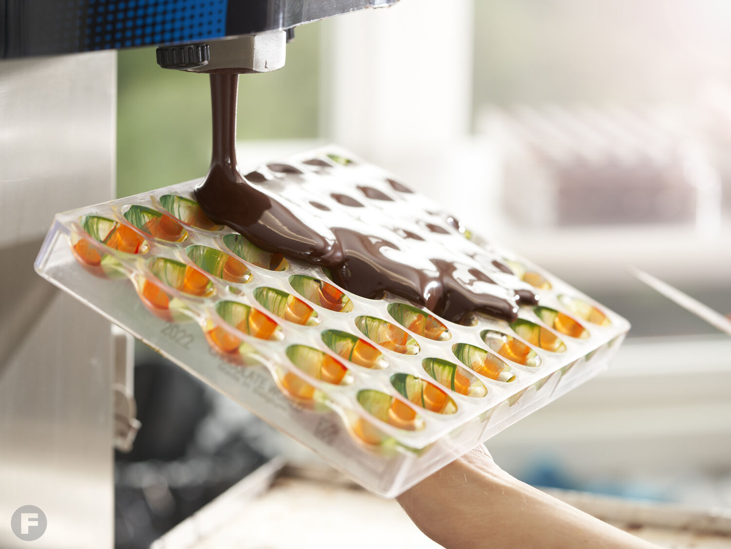 Bijoux Handcrafted Chocolates chocolate pouring